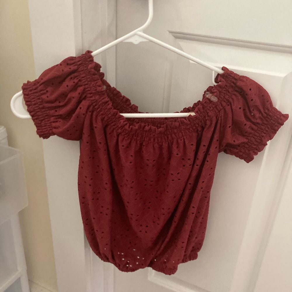 Burgundy eyelet top.  Sized M